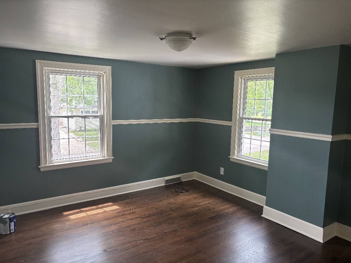Bedroom interior painted in calming sage teal by Fortoso Painting in Galesburg, Michigan