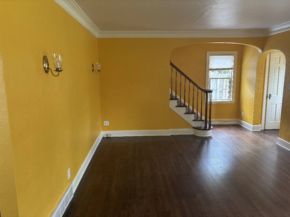 Warm golden yellow living room painted by Fortoso Painting in Three Rivers, Michigan