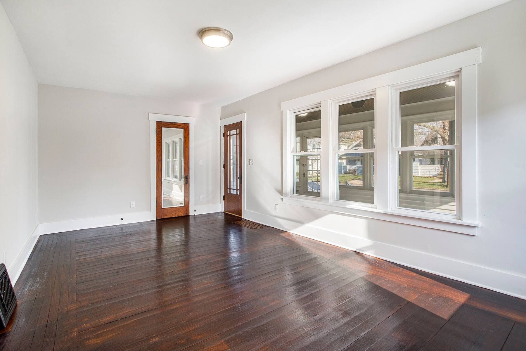 Bright white living room interior painted by Fortoso Painting in Marshall, Michigan